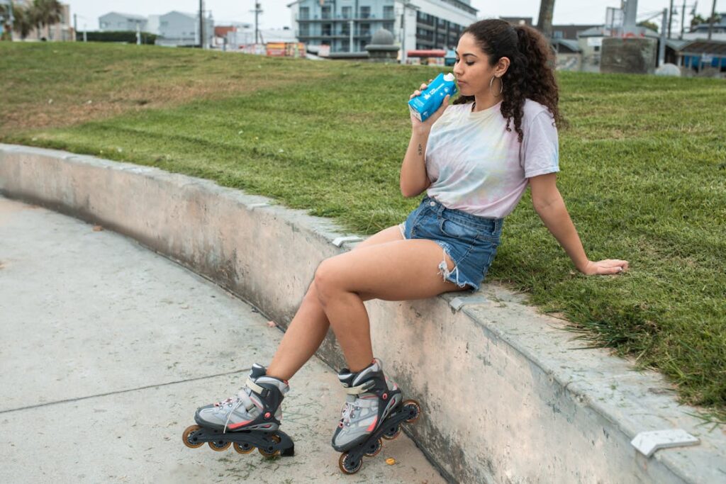 Woman Sitting on a Concrete Railing